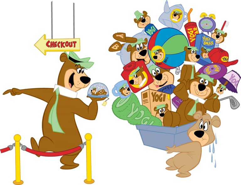 Yogi Bear and Boo-boo carryiing a load of souvenirs
